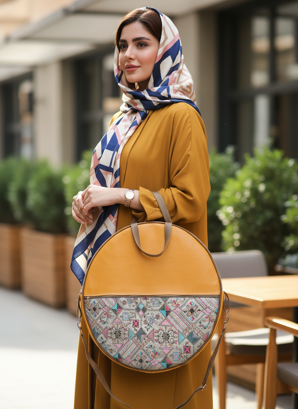کیف دف چرم خردلی با ترکیب پارچه مجلسی